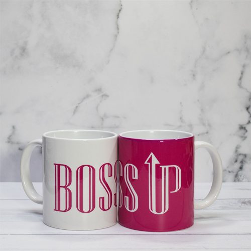 Mugs that read Boss Up in pink and white.